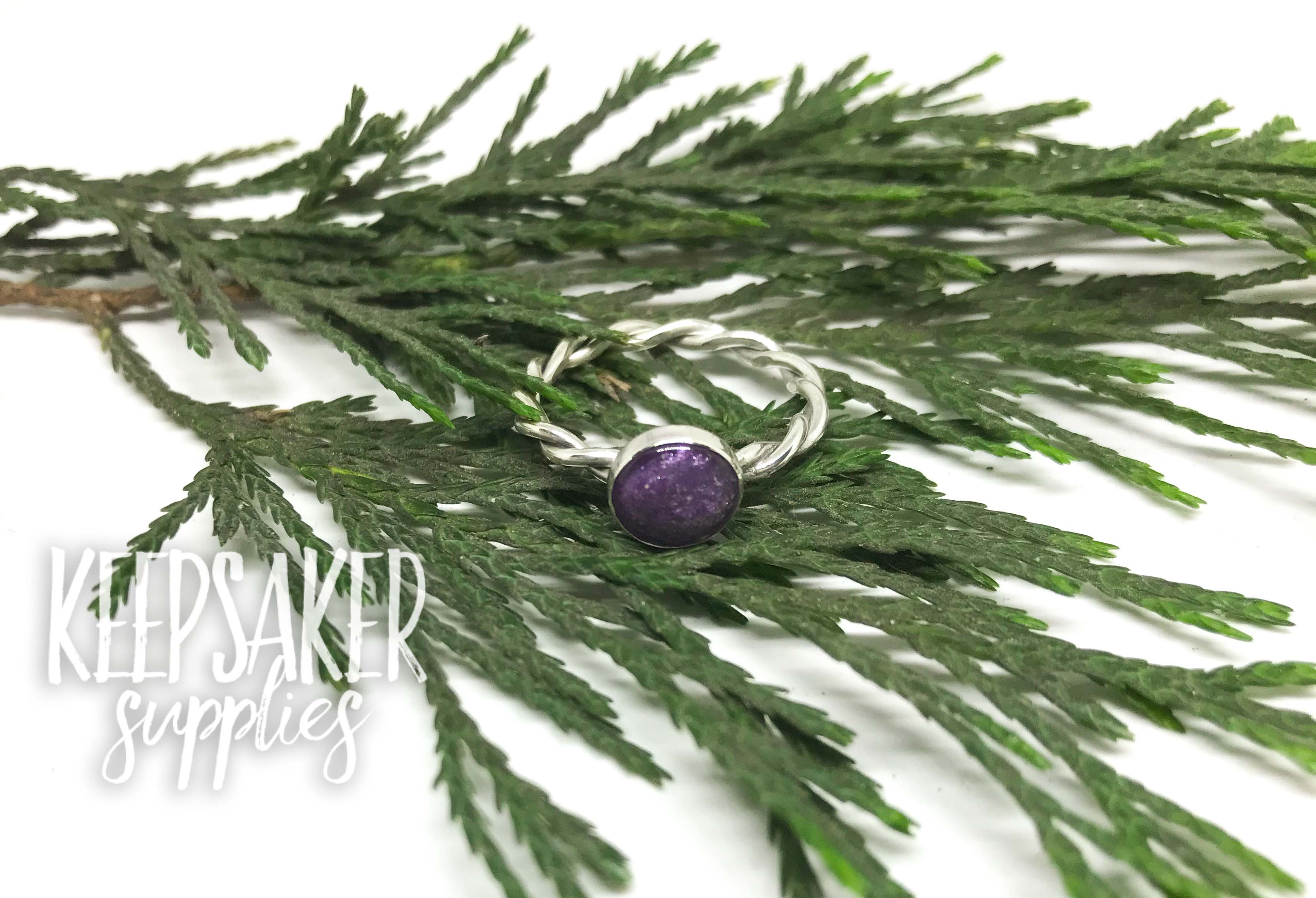 cremtion ashes ring twisted band, 8mm cabochon with ashes stone containing orchid purple resin sparkle mix