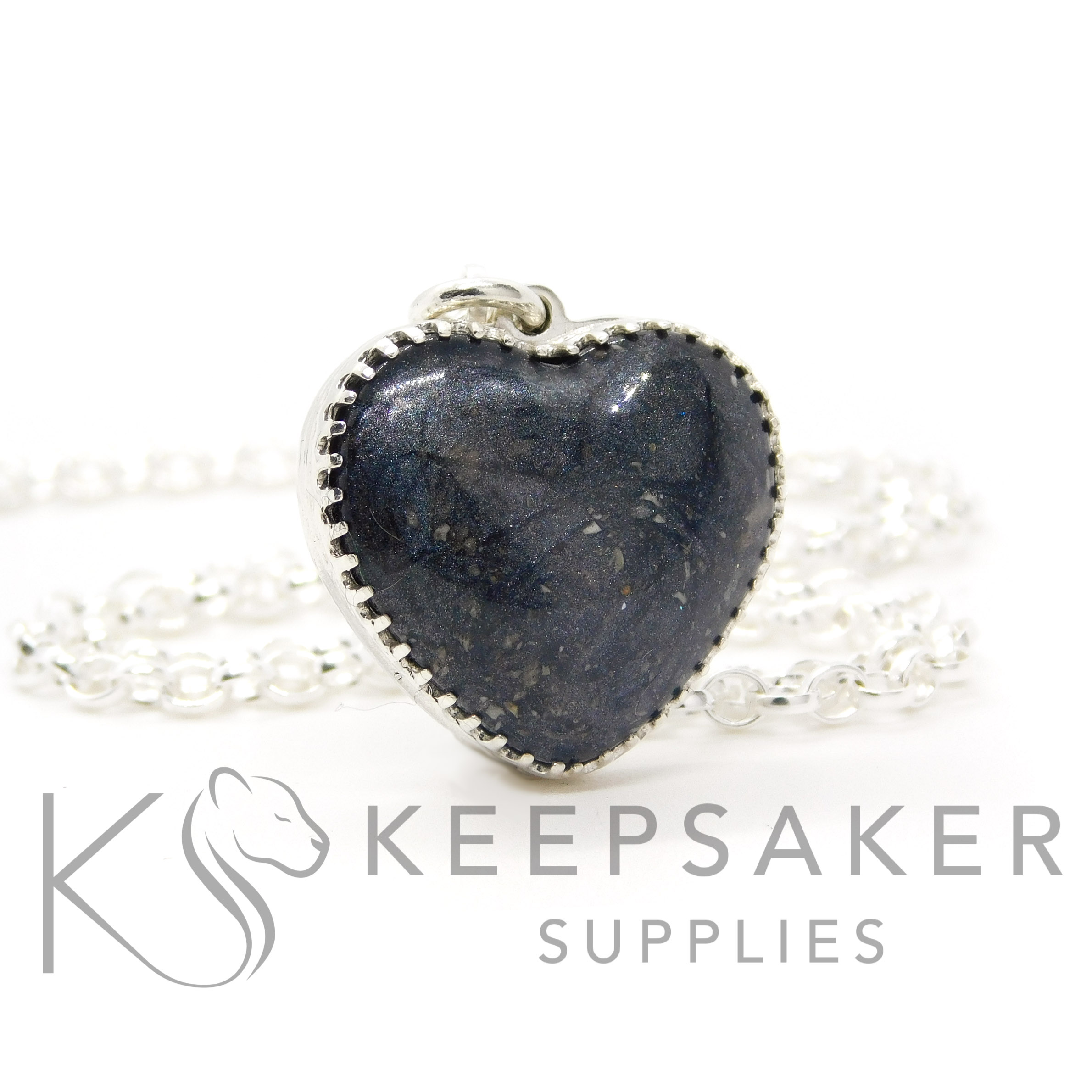 New style heart necklace setting with scalloped edge. Vampire black resin sparkle mix, shown with a medium classic chain upgrade