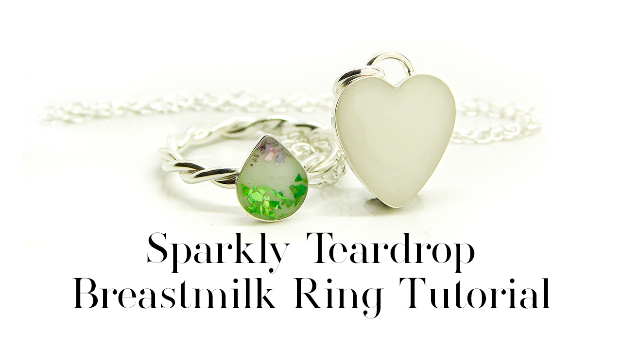 breastmilk teardrop ring sparkles and heart necklace, apple green and violet silver holographic flakes on a twisted band. 8x6mm teardrop handmade breastmilk ring, 12mm heart necklace breastfeeding keepsake. Sparkly Teardrop Breastmilk Ring Tutorial