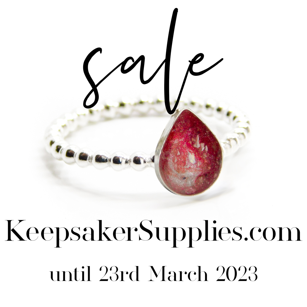 Massive Jewellery Supplies Sale Sale Now On,  up to 70% off memorial and breastmilk jewellery making supplies. No need for a discount code, items are already on sale. The sale ends on the 23rd March 2024.Use this opportunity to stock up on a few extra bits, larger quantities and even our keepsake startup kits and courses. white and red ashes bubble ring. Keepsake jewellery making with cremation ashes and resin sparkle mix. Made by hand in the UK memorial jewelry with cremains. Bubble setting with pearl wire, 10x8mm teardrop bezel cup. Image mockup