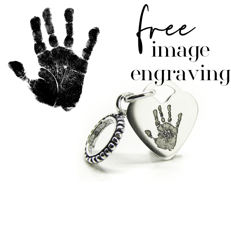 free image engraving March 2025 handprint heart necklace or dangle charm, baby keepsake pendant in solid silver. Shown with bubble dangle charm setting for European bracelets Laser engraved, hand print mother's day mum gift ideas. Original taken from a child using an inkless wipe kit, transparency PNG shown